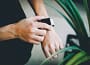 Person use silver Apple Watch